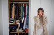 Cluttered Closet Messy Chaos Overwhelmed Woman