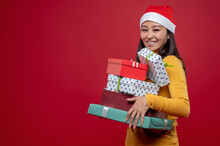 Young Pretty Woman With Christmas Gifts