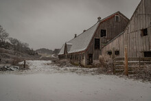Abandoned Barn During A Snow Shower