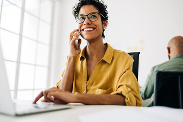 Wall Mural - Accountant making phone calls in an accounting firm