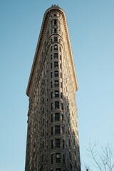 NEW YORK, USA - March 19, 2018 : Flat Iron building facade on March 19, 2018. Completed in 1902, it is considered to be one of the first skyscrapers ever built