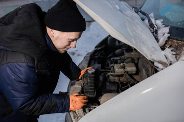 Wall Mural - truck van car driver fixing the car in winter on the road. Delivery car breakdown in winter