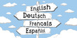 © PX Media - English, German, French, Spanish - outline signpost with four arrows