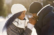 © prostooleh - African american couple in a winter forest