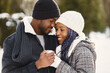 © prostooleh - African american couple in a winter forest