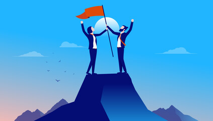 Wall Mural - Businesspeople on mountaintop - Two cheerful people on top of mountain raising flag and celebrating success and winning. Flat design vector illustration with blue background