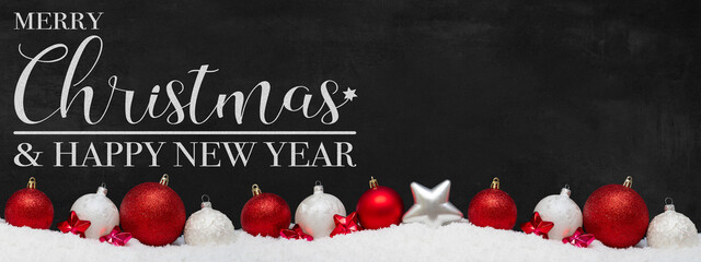 Wall Mural - Merry Christmas & happy new year ornaments celebration holiday holidays banner greeting card panorama long - Red and white christmas baubles and stars on snow, with black concrete wall in background