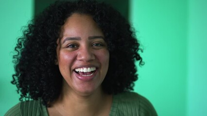 Wall Mural - Portrait of a happy Brazilian black woman laughing at camera