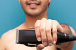 © Narayan - man with hair clipper, haircut concept