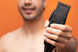 © Narayan - man with hair clipper, haircut concept