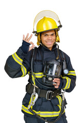 Poster - Young smiling African-American fireman in a fireproof uniform stands and make gesture ok. Isolated on white, vertical orientation