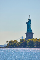 Wall Mural - Iconic American Statue of Liberty from back in shade vertical