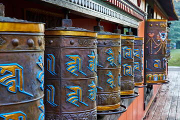 Wall Mural - Tibetan Mongolian Buddhist shrine with ornate prayer wheels
