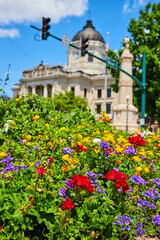 Poster - Detail of colorful summer flowers with Bloomington Indiana courthouse in background