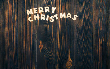 Wall Mural - Christmas wooden background with fir branches and a place to copy.