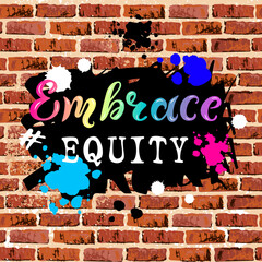 Wall Mural - Handwritten Embrace Equity as graffiti on brick wall. Embrace Equity is campaign theme of International Woman's Day 2023.