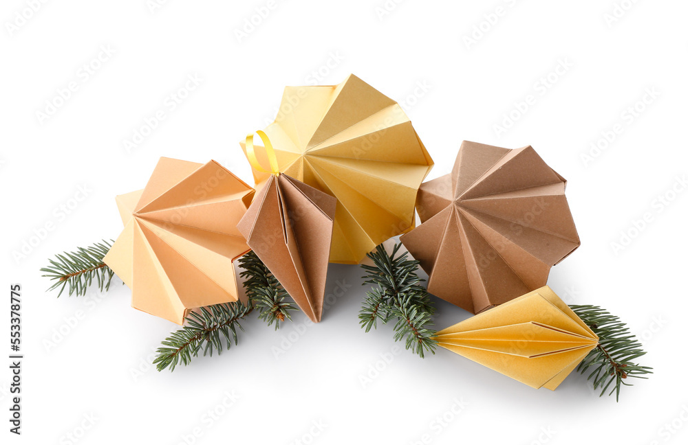 Paper Christmas balls with fir branches on white background