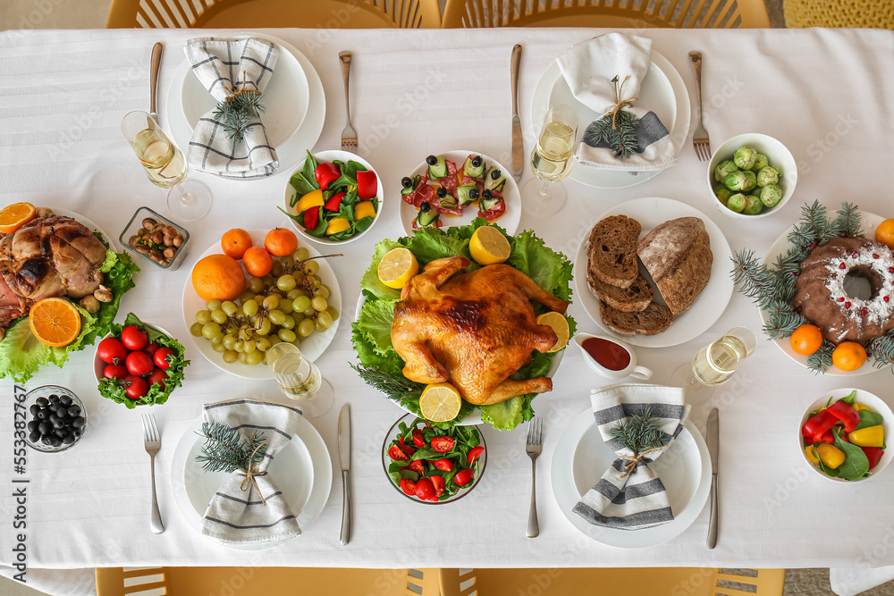 Tasty dishes for Christmas celebration on table