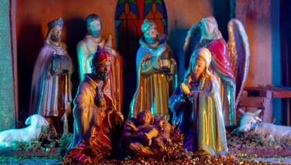 Christmas nativity scene. Christmas scene of born child baby Jesus Christ in the manger with Joseph and Mary.