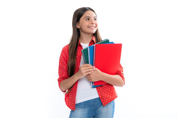 Back to school. Teenager schoolgirl with book ready to learn. School girl children on isolated white studio background. Portrait of happy smiling teenage child girl.