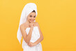 © Olena - happy teen girl in shower towel with cream on face. copy space