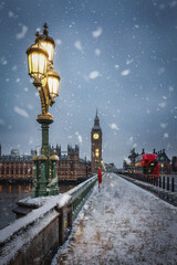 Wall Mural - Beautiful winter view of the Westminster Bridge and Big Ben clocktower in London during a winter day with ice and snow, England