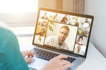 Wall Mural - video conference. Multiethnic business team using laptop for a online meeting in video call. Group of people smart working from home