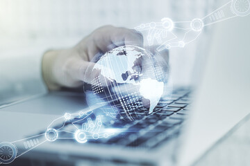 Aufkleber - Creative concept of robotics technology with globe sketch and hands typing on laptop on background. Robot development and automation concept. Multiexposure