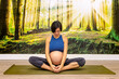 © Alfonso Soler - Prenatal Yoga. Yoga instructor in lotus position.