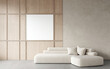 © Hanna - 3d rendering of modern living room with white sofa with pillows, decorative wall with embossed panels, concrete floor.Empty white frame for picture or art on wood panel. Frame mockup. 3d rendering