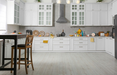 Wall Mural - Beautiful kitchen interior with stylish modern furniture