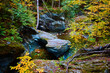 Stunning fall gorge river with rocks carved by waters