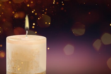 Canvas Print - Burning candle light on dark background