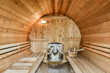 © ADDICTIVE STOCK - Wooden sauna with tube-shaped seats