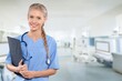 © BillionPhotos.com - Young nurse or doctor wearing uniform