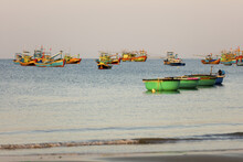 Colourful Fishing Boats Moored In The Water, Ke Ga Cape; Ke Ga, Vietnam