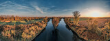 Rzeka Olza wpada do rzeki Odry, obie rzeki wyznaczają granicę Polski i Czech, widok z lotu ptaka jesienią