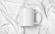 © Marykor - Mockup white cup tea, coffee blank template for your advertising promotion on the textile background, linens, cleanliness