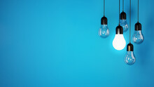 The Concept Of A Light Bulbs On Blue Background, Place For Text And Design, Light Bulbs Background