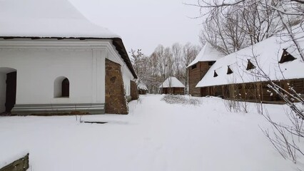 Canvas Print - Sotnyk's House in winter Mamajeva Sloboda Cossack Village, Kyiv, Ukraine