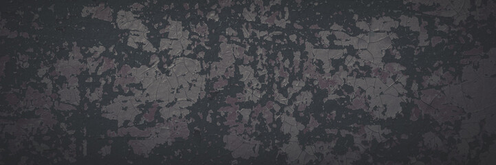 dark wide panoramic background. peeling paint on a concrete wall. faded dark texture of old cracked 