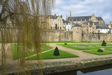 Wall Mural - Vannes, medieval city in Brittany, view of the ramparts garden with flowerbed 