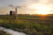A Mailbox In The Heartland At Sunset