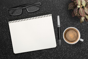 Wall Mural - Blank notebook and cup, glass on office table.