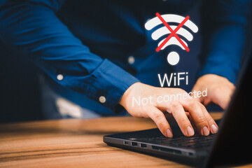 Poster - Man using a computer laptop to connect to wifi but wifi not connected, and waiting to loading digital business data form website, concept technology of waiting for connect to wifi.