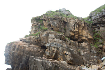 Wall Mural - Isolated PNG cutout of a cliff on a transparent background, ideal for photobashing, matte-painting, concept art