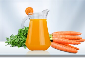 Poster - Fresh healthy Carrot juice and vegetables on the desk