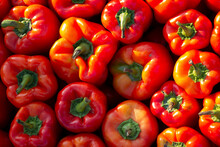 Background Photo With Red Bell Peppers In Grocery Store Window. Concept Of Buying Farm Products In The Street Market Of Georgian City Of Tbilisi. Vegetarian Salad Ingredients. Vegan. Fruit Shop
