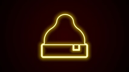 Sticker - Glowing neon line Beanie hat icon isolated on black background. 4K Video motion graphic animation