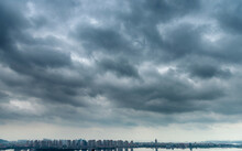 Dark Clouds Over A City By The Sea
